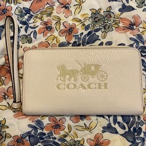 New White Coach wristlet wallet with larger inside pocket for phone or checkbook